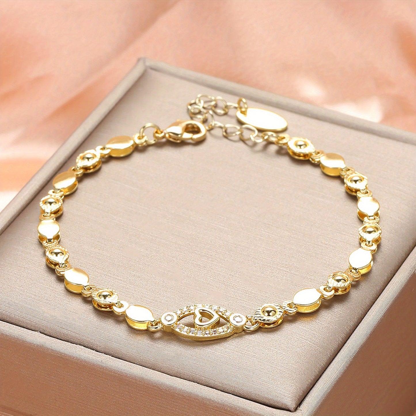 Elegant 18K Golden Plated Copper Bracelet with Synthetic Cubic Zirconia, Heart and Leaf Motif Openwork Design for Daily Wear and Special Occasions