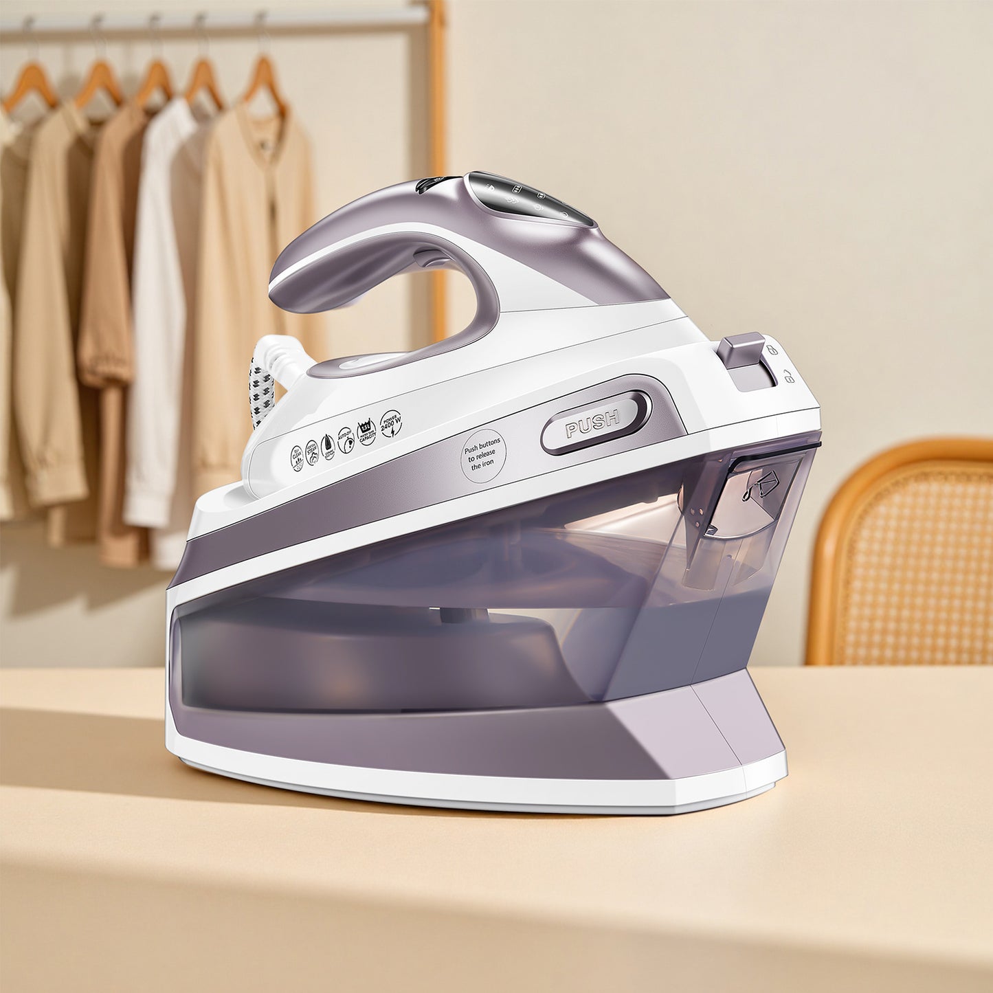 Steam Station Iron offers 5.5 bar pressure, a 1.5L water tank, a ceramic soleplate, an anti-limescale function, vertical steaming, three adjustable temperatures, cord storage, 2400W power, and comes in light purple., Steam Ir