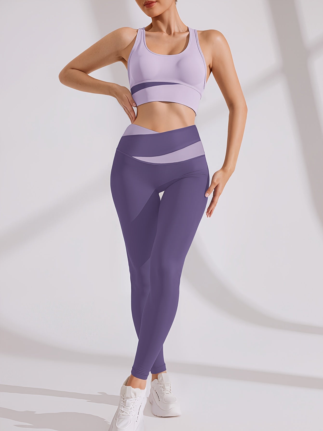 Women's 2-piece sports set with sports bra and leggings, color block design suitable for cycling, fitness, yoga, and running.