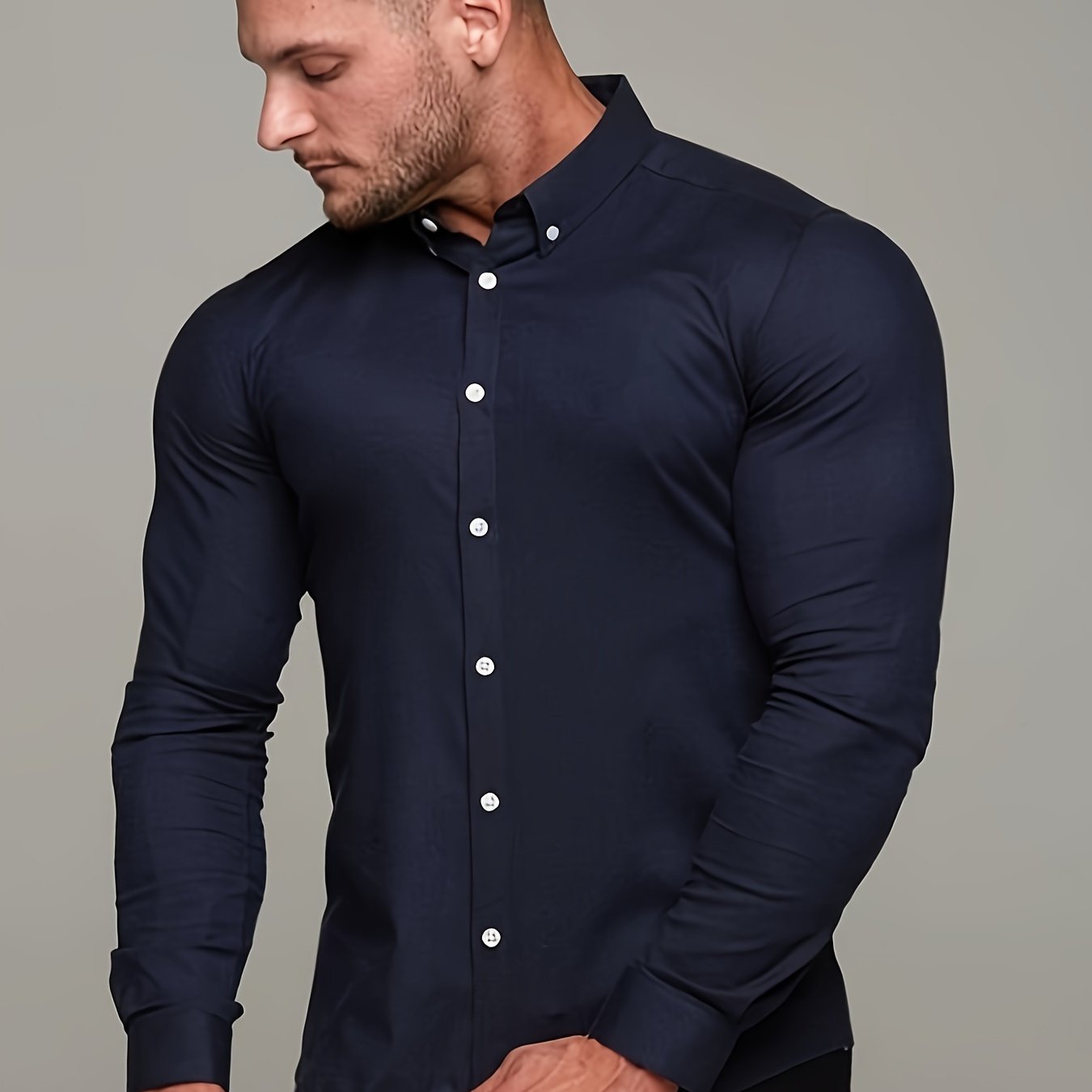 Camisa de homem de manga comprida, corte slim, cor sólida, tecido elástico de secagem rápida e fecho de botões. Ideal para atividades físicas na primavera e no outono.