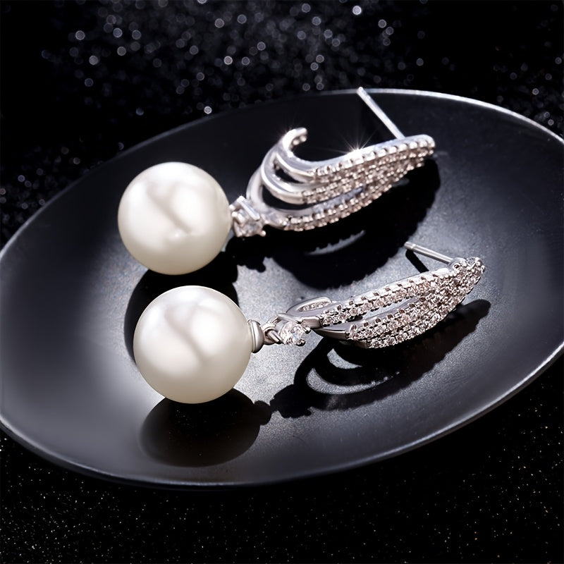 Um par de brincos pendentes para mulher em prata 925 com pérolas de água doce requintadas, acessórios de joalharia hipoalergénicos em estilo boémio, presente para mulher com caixa de oferta exclusiva.