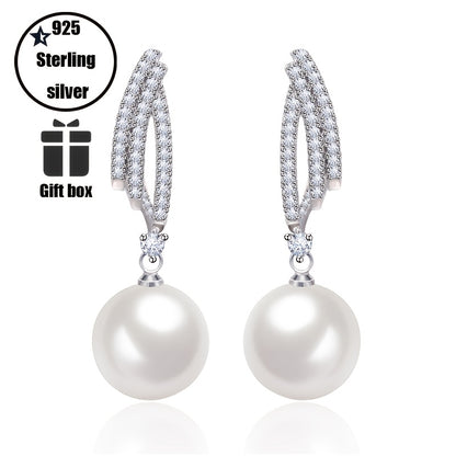 Um par de brincos pendentes para mulher em prata 925 com pérolas de água doce requintadas, acessórios de joalharia hipoalergénicos em estilo boémio, presente para mulher com caixa de oferta exclusiva.