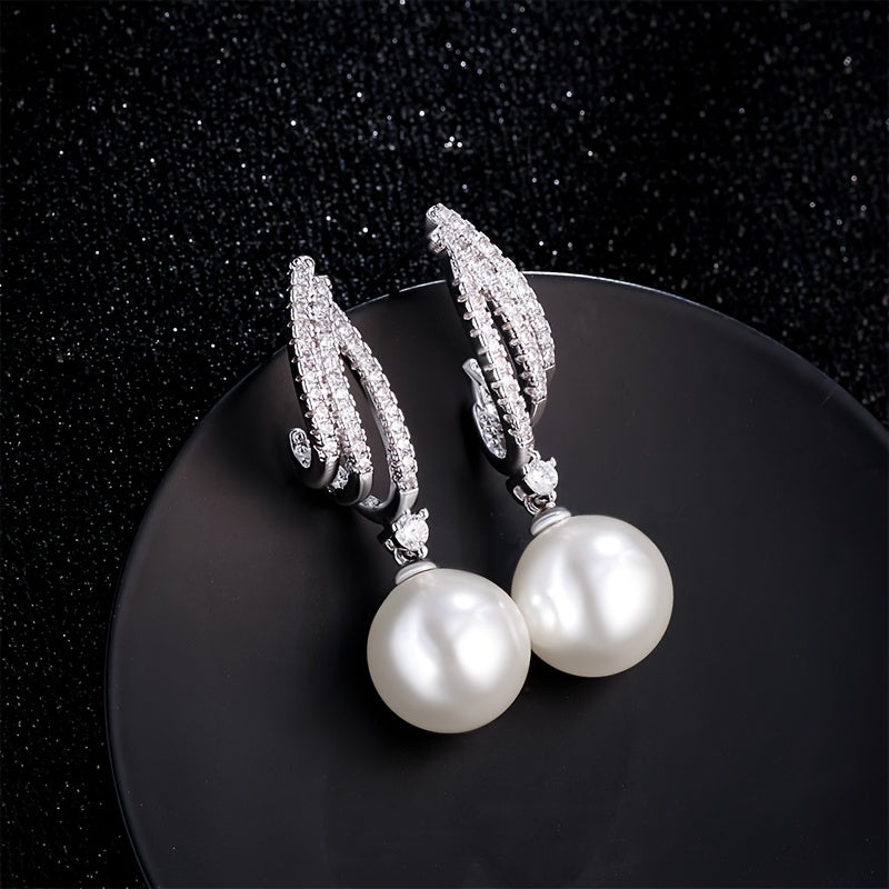 Um par de brincos pendentes para mulher em prata 925 com pérolas de água doce requintadas, acessórios de joalharia hipoalergénicos em estilo boémio, presente para mulher com caixa de oferta exclusiva.