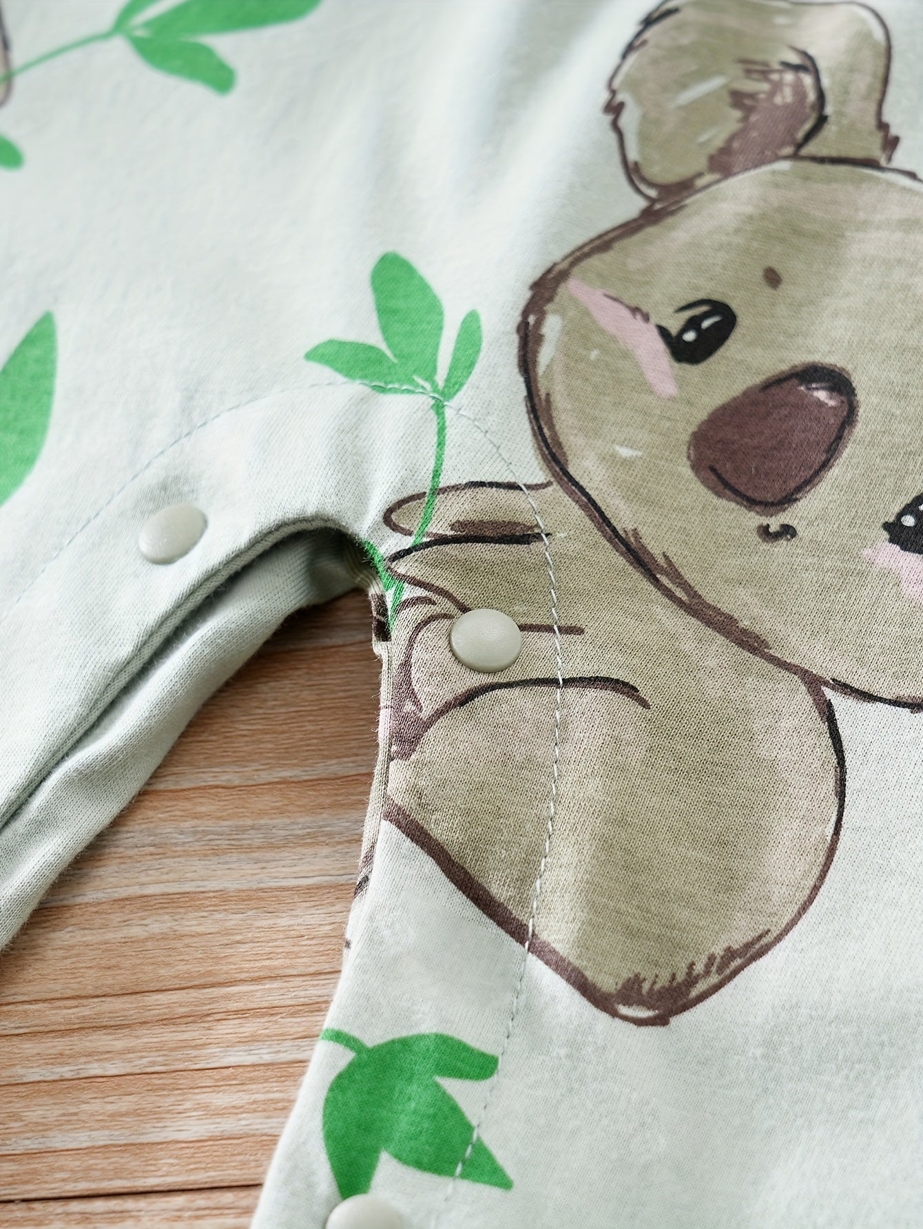 Macacão de manga comprida com gola redonda para bebé com estampado fofo de coala de desenho animado