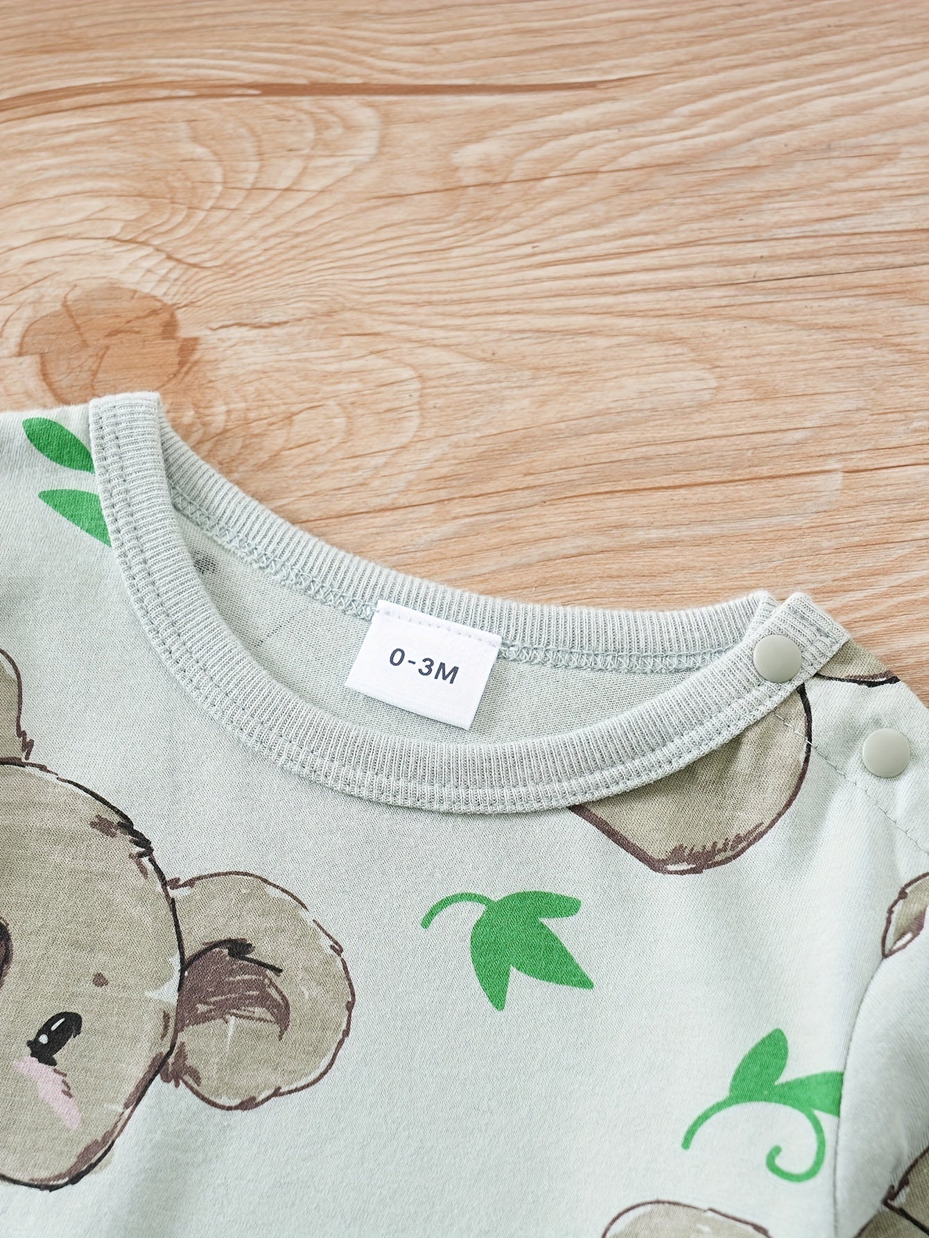 Macacão de manga comprida com gola redonda para bebé com estampado fofo de coala de desenho animado