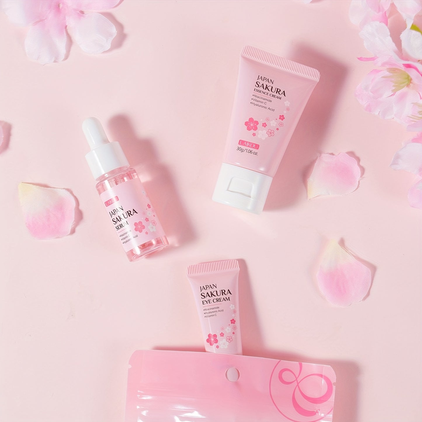 Kit de cuidados de pele LAIKOU Sakura com 3 peças - Kit de viagem com sérum, creme facial e creme de olhos (17ml, 30g - Niacinamida e Vitamina C, Ácido Hialurónico, Todos os tipos de pele, Unissexo, Essenciais de beleza | Estética Rosa | Kit compacto