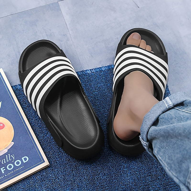 Chinelo unissexo casual às riscas, bico redondo, sola macia em EVA antiderrapante e antirriscos, ideal para caminhadas, atividades ao ar livre e uso diário.