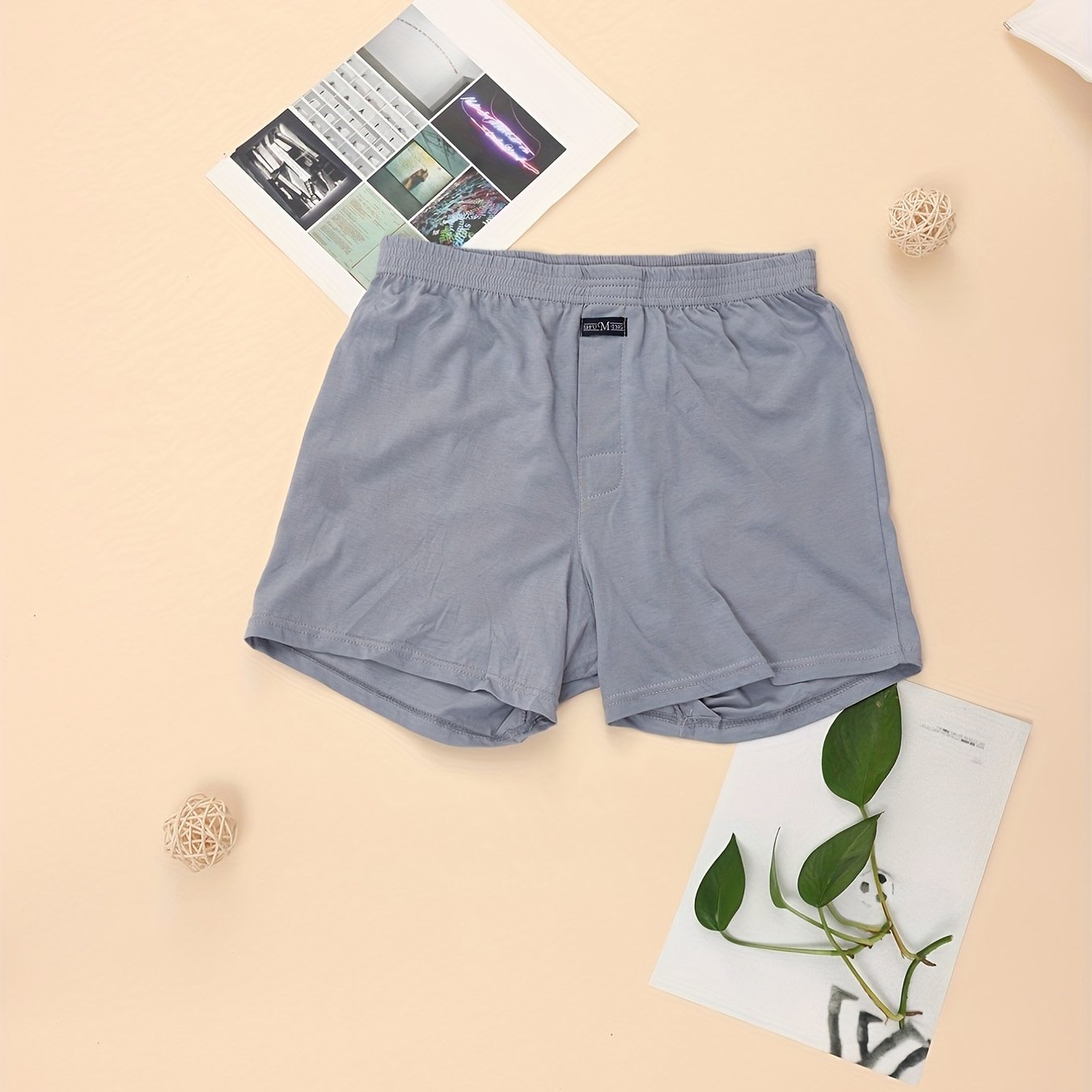 Calça de homem em algodão puro com estampado de flechas, larga, ideal para pijamas, de cintura subida e com gancho profundo.