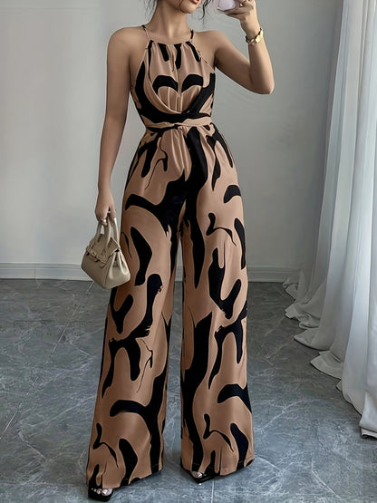 Elegante macacão feminino com ombros à mostra, estampado abstrato a preto e branco, pernas largas e atilhos na cintura - tecido de poliéster, perfeito para as férias e para um toque de elegância no dia a dia.