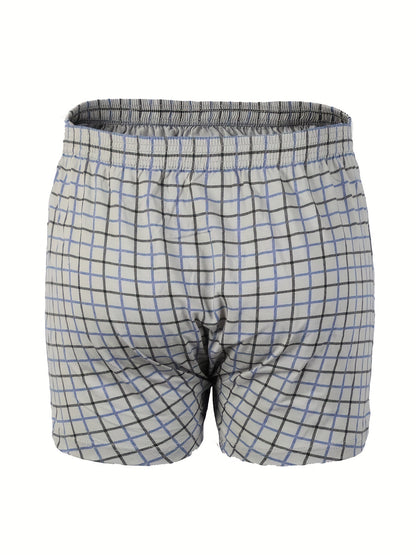 Calça de homem em algodão puro com estampado de flechas, larga, ideal para pijamas, de cintura subida e com gancho profundo.