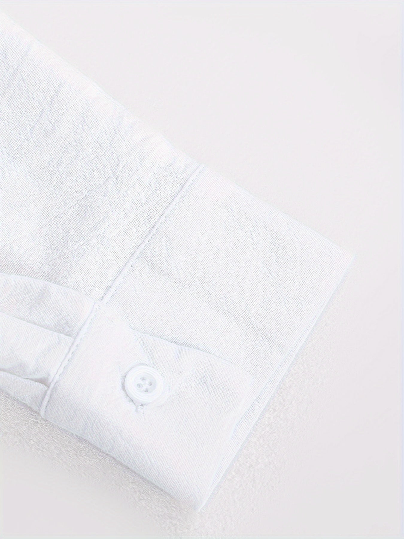 Camisa de homem em algodão de manga comprida e cor sólida com botões, modelo com lapela, ideal para a primavera e outono.