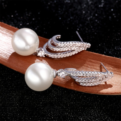 Um par de brincos pendentes para mulher em prata 925 com pérolas de água doce requintadas, acessórios de joalharia hipoalergénicos em estilo boémio, presente para mulher com caixa de oferta exclusiva.