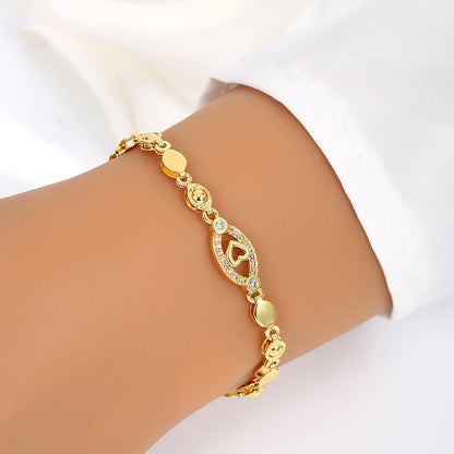 Elegant 18K Golden Plated Copper Bracelet with Synthetic Cubic Zirconia, Heart and Leaf Motif Openwork Design for Daily Wear and Special Occasions