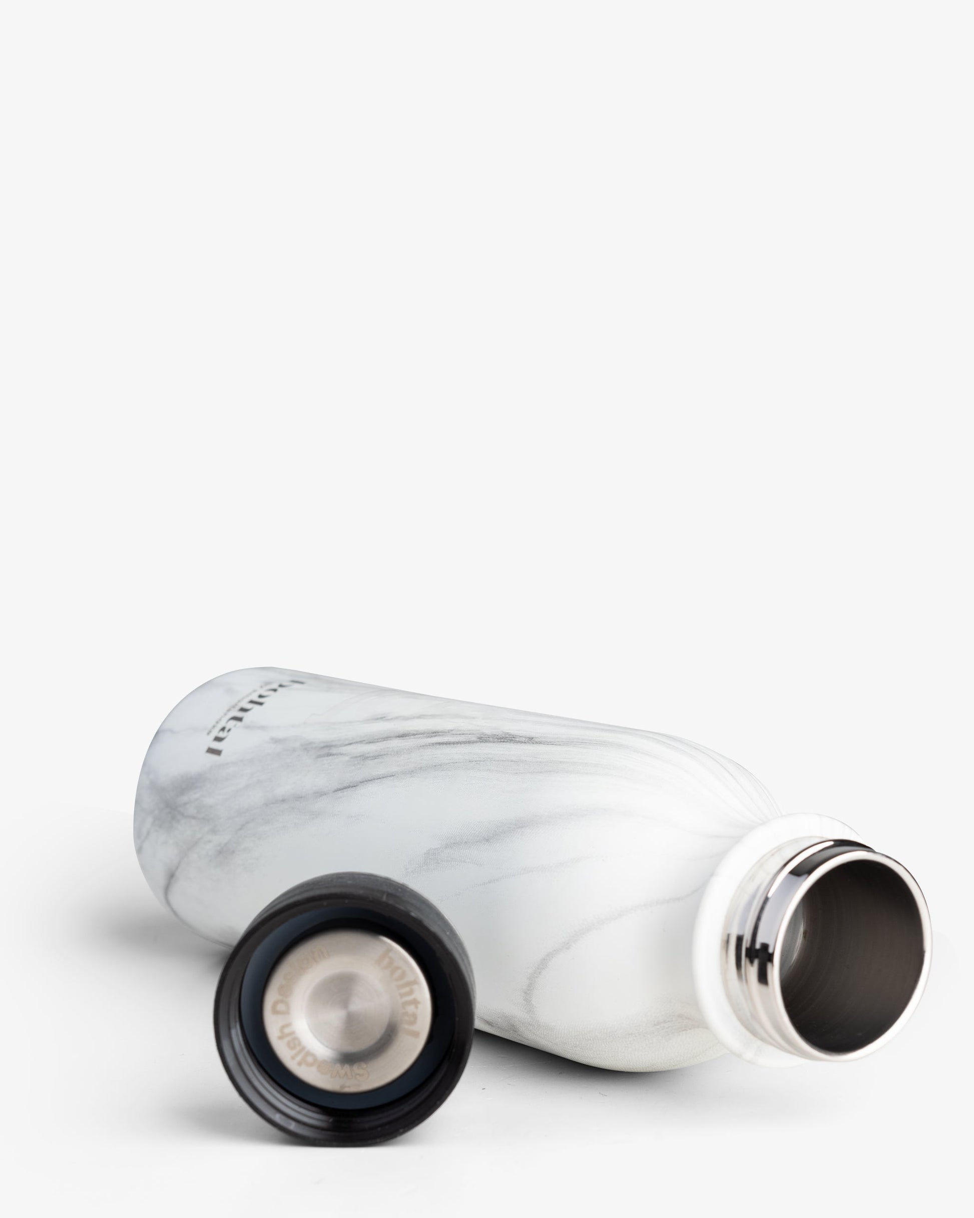 https://ik.imagekit.io/c2dr4dawp/https%3A%2F%2Fcdn.shopify.com%2Fs%2Ffiles%2F1%2F0484%2F7091%2F7273%2Ffiles%2FBohtal_Insulated_Flask_White_Marble_unassamble.jpg%3Fv%3D1714647104?tr=f-jpg