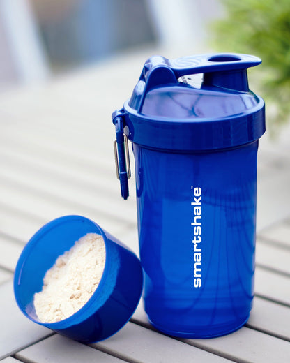 https://ik.imagekit.io/c2dr4dawp/https%3A%2F%2Fcdn.shopify.com%2Fs%2Ffiles%2F1%2F0484%2F7091%2F7273%2Ffiles%2FSmartshake_Original2GoONE_Navy_Blue_lifestyle.jpg%3Fv%3D1702464128?tr=f-jpg
